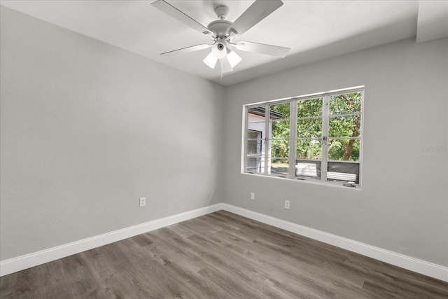 2014 10th St NW, Winter Haven, FL 33881 - unfurnished room featuring a ceiling fan, baseboards, and dark wood-type flooring