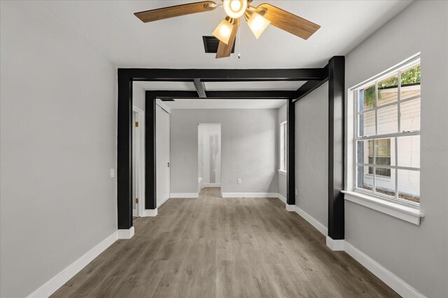 2014 10th St NW, Winter Haven, FL 33881 - interior space featuring baseboards, ceiling fan, wood finished floors, and visible vents