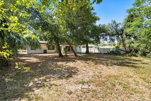 2014 10th St NW, Winter Haven, FL 33881 - view of yard with fence