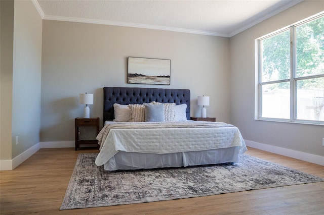 4837 Lorraine Way, Orlando, FL 32812 - bedroom featuring ornamental molding, multiple windows, and wood finished floors