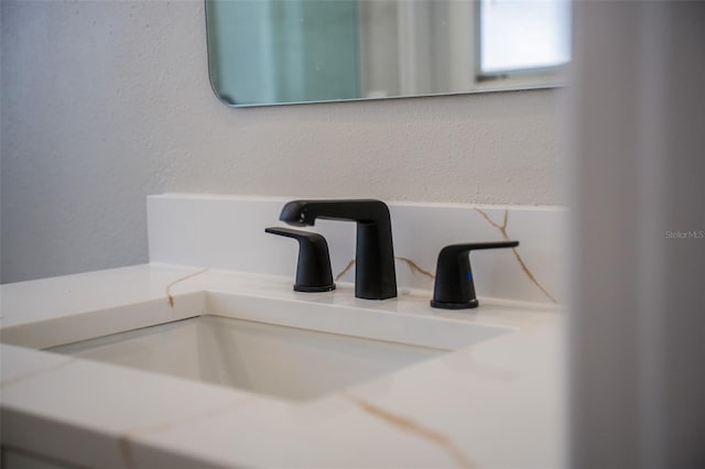 4837 Lorraine Way, Orlando, FL 32812 - details with a textured wall and a sink