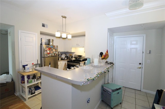 kitchen with light tile patterned flooring, appliances with stainless steel finishes, white cabinetry, a peninsula, and visible vents