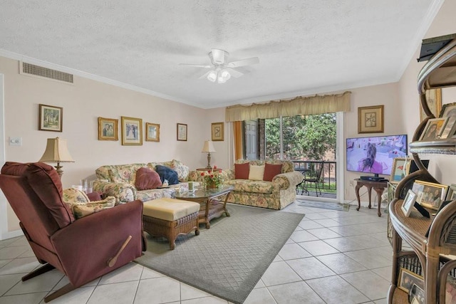 4262 Lake Underhill Rd Unit 9C7, Orlando, FL 32803 - living area with a ceiling fan, light tile patterned floors, crown molding, and a textured ceiling