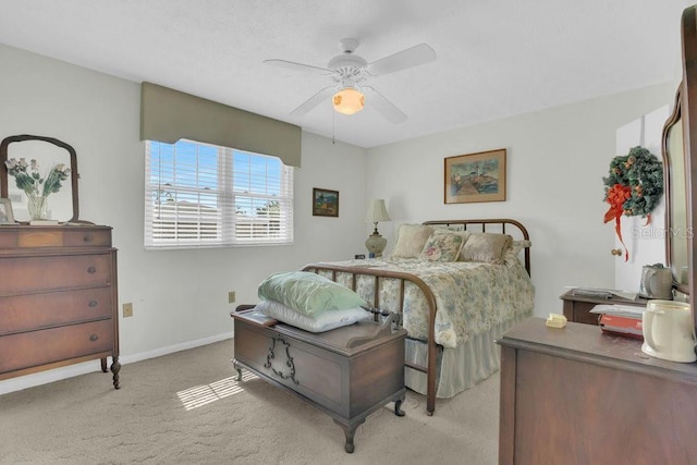 4262 Lake Underhill Rd Unit 9C7, Orlando, FL 32803 - bedroom with light colored carpet, baseboards, and a ceiling fan