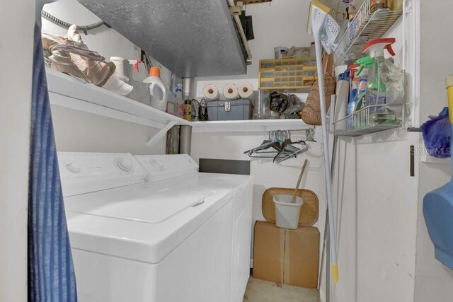 4262 Lake Underhill Rd Unit 9C7, Orlando, FL 32803 - clothes washing area with washer and clothes dryer