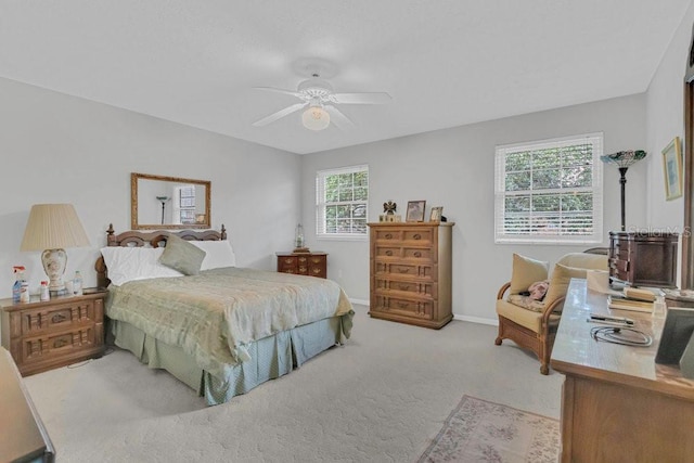 4262 Lake Underhill Rd Unit 9C7, Orlando, FL 32803 - carpeted bedroom featuring baseboards and a ceiling fan
