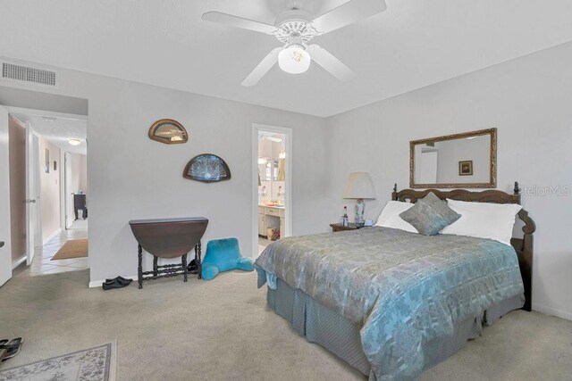 4262 Lake Underhill Rd Unit 9C7, Orlando, FL 32803 - carpeted bedroom with baseboards and a ceiling fan