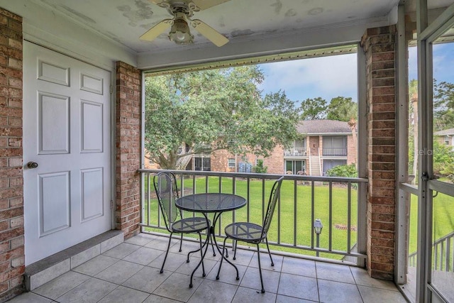 4262 Lake Underhill Rd Unit 9C7, Orlando, FL 32803 - balcony featuring a ceiling fan