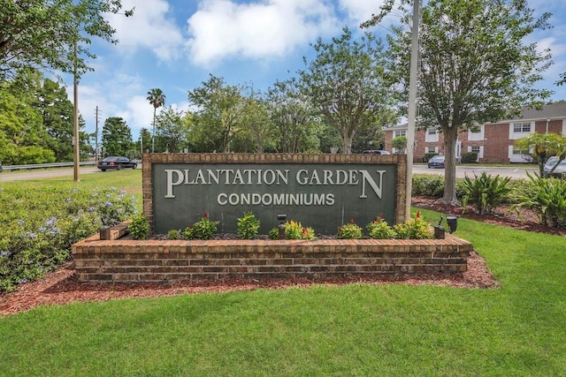 4262 Lake Underhill Rd Unit 9C7, Orlando, FL 32803 - community sign featuring a lawn