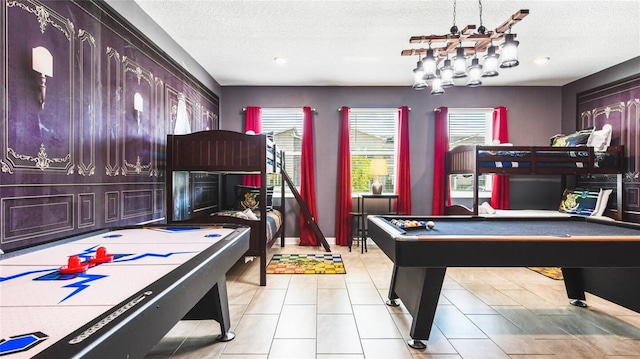 rec room featuring billiards, tile patterned floors, recessed lighting, and a textured ceiling