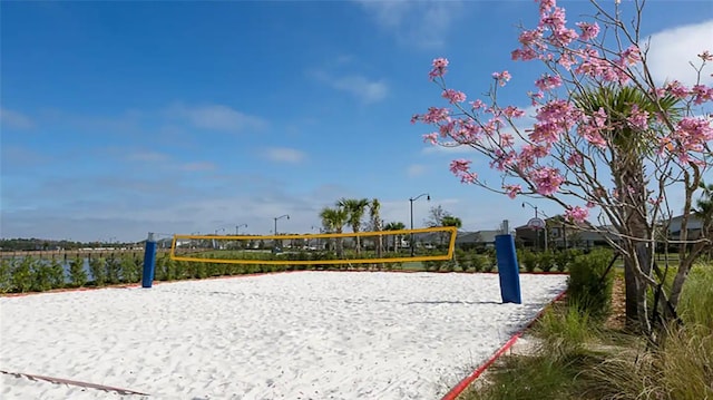 view of property's community featuring volleyball court