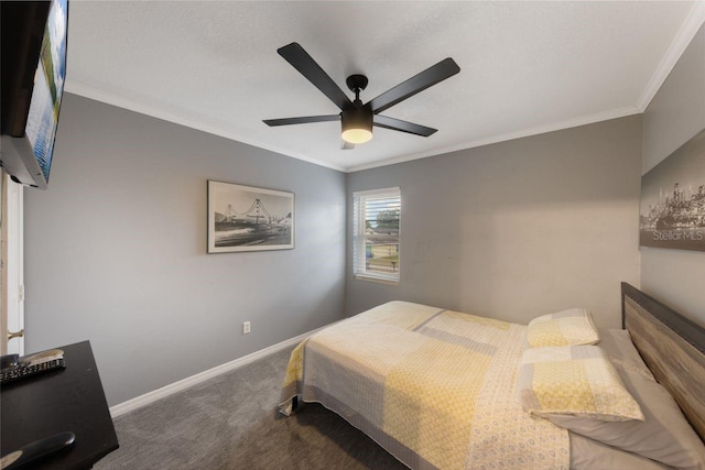 bedroom with baseboards, crown molding, and carpet