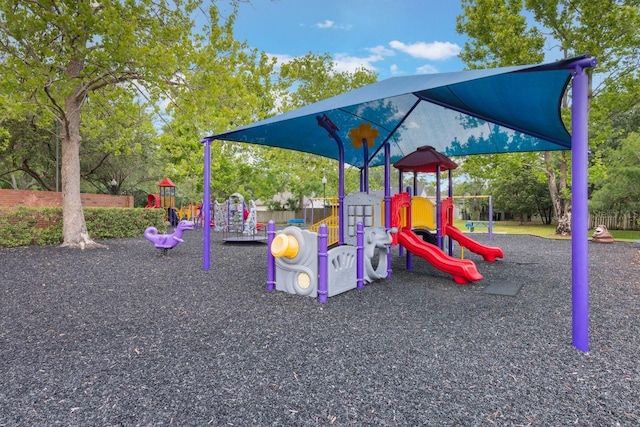 community play area featuring fence