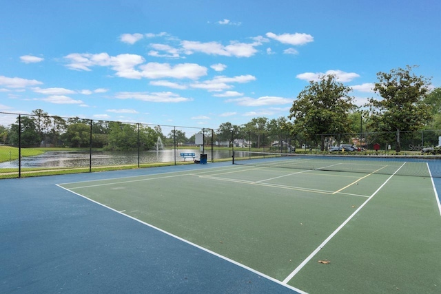 view of tennis court with fence
