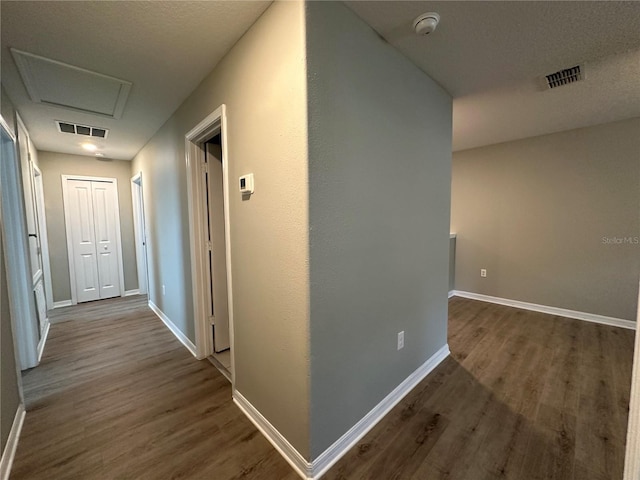 13344 Great Plains Dr S, Riverview, FL 33579 - corridor with baseboards, visible vents, wood finished floors, and attic access