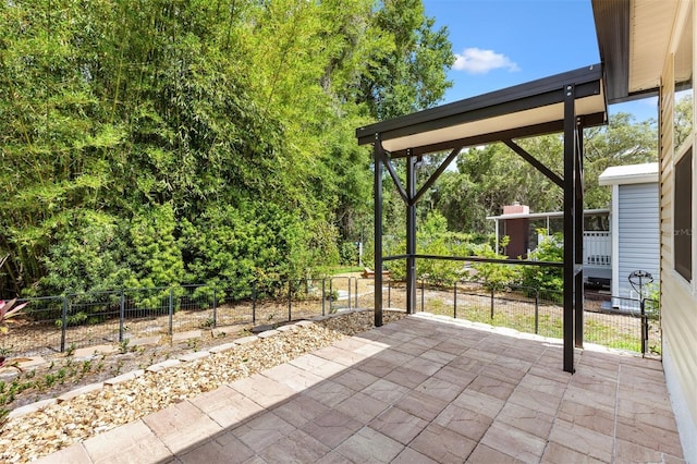 view of patio with fence