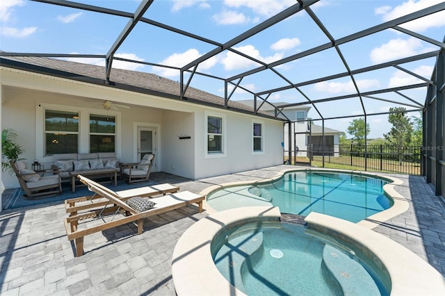 view of swimming pool featuring an outdoor hangout area, a pool with connected hot tub, and a patio area
