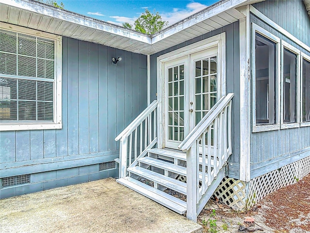499 W Beresford Rd, Deland, FL 32720 - entrance to property featuring crawl space and french doors