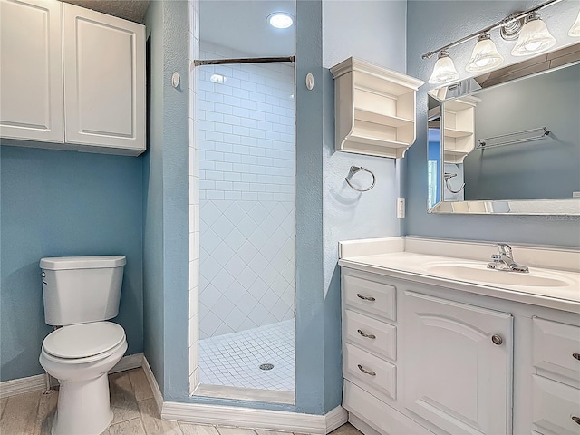499 W Beresford Rd, Deland, FL 32720 - full bath featuring a shower stall, toilet, vanity, baseboards, and a textured wall