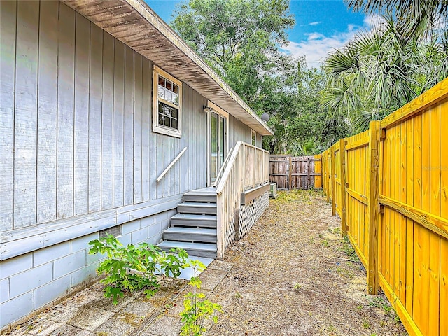 499 W Beresford Rd, Deland, FL 32720 - view of home's exterior with a fenced backyard and crawl space