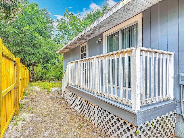499 W Beresford Rd, Deland, FL 32720 - view of side of home with fence and a deck