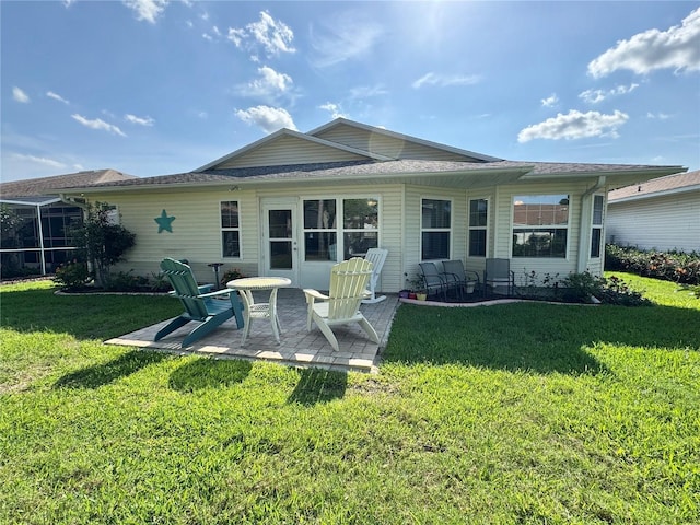 32900 Crooked Oaks Ln, Leesburg, FL 34748 - rear view of property featuring a yard and a patio