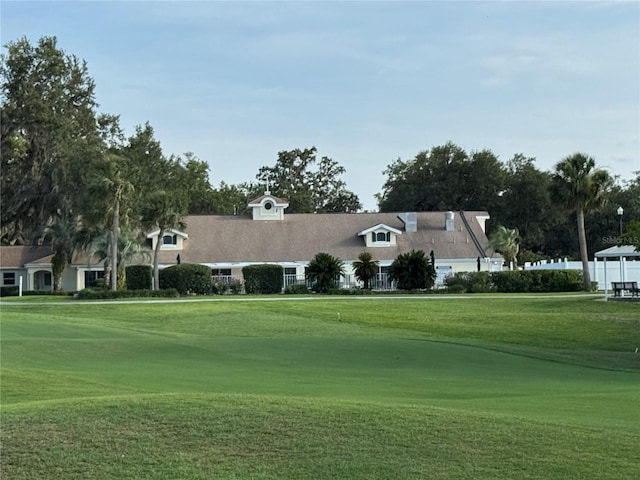 32900 Crooked Oaks Ln, Leesburg, FL 34748 - view of community featuring golf course view and a lawn