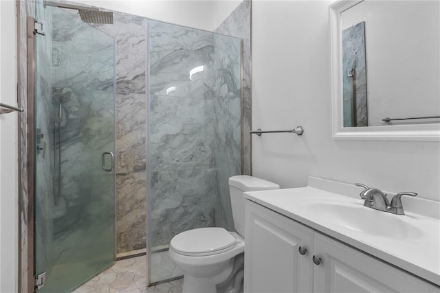 bathroom featuring vanity, marble finish floor, a marble finish shower, and toilet