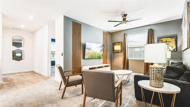 2936 Protagonist St, Kissimmee, FL 34746 - sitting room featuring visible vents, a ceiling fan, carpet, and baseboards
