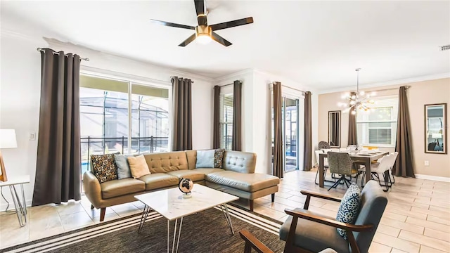 2936 Protagonist St, Kissimmee, FL 34746 - living room with baseboards, ornamental molding, ceiling fan with notable chandelier, and visible vents