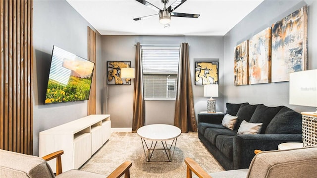 2936 Protagonist St, Kissimmee, FL 34746 - living area featuring ceiling fan, plenty of natural light, baseboards, and light carpet