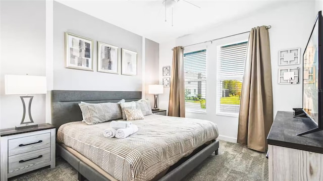2936 Protagonist St, Kissimmee, FL 34746 - bedroom with baseboards, a ceiling fan, and carpet