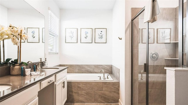 2936 Protagonist St, Kissimmee, FL 34746 - bathroom with a garden tub, a sink, a stall shower, and double vanity