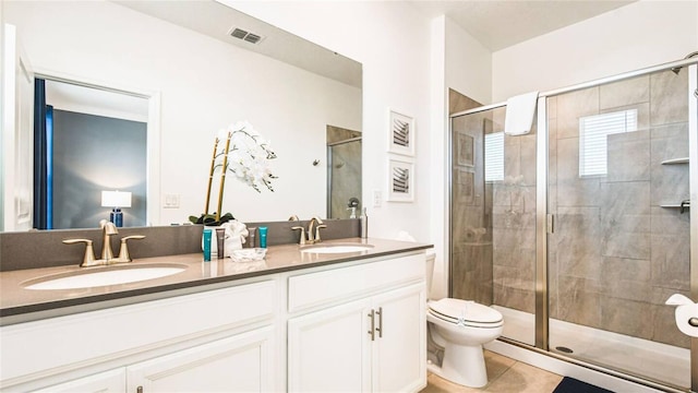 2936 Protagonist St, Kissimmee, FL 34746 - full bath with visible vents, a sink, a stall shower, and double vanity