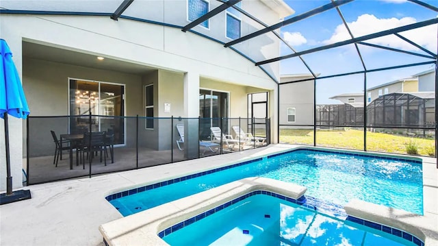 2936 Protagonist St, Kissimmee, FL 34746 - view of pool with a patio area, a lanai, and a pool with connected hot tub