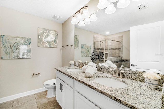 bathroom with visible vents, a sink, baseboards, and a shower stall