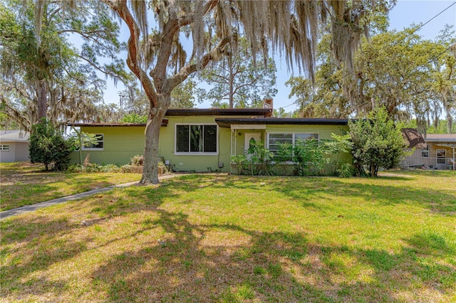 1108 Gibson St, Leesburg, FL 34748 - view of front of house with a front lawn