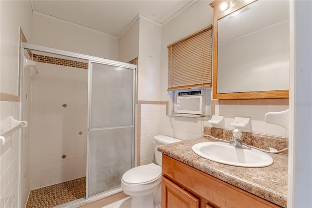 1108 Gibson St, Leesburg, FL 34748 - bathroom with tile walls, ornamental molding, a stall shower, toilet, and vanity