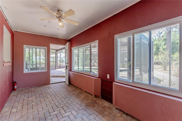 1108 Gibson St, Leesburg, FL 34748 - unfurnished sunroom featuring healthy amount of natural light