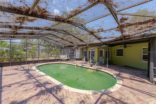 1108 Gibson St, Leesburg, FL 34748 - outdoor pool with a patio area, a ceiling fan, and a lanai