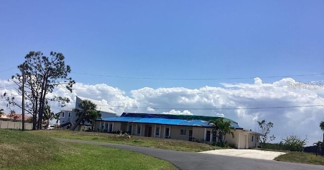 3360 Peace River Dr, Punta Gorda, FL 33983 - single story home with driveway and a front lawn