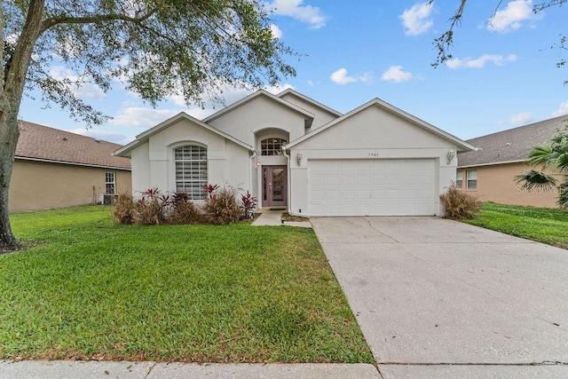 ranch-style home featuring stucco siding, concrete driveway, a front lawn, and a garage
