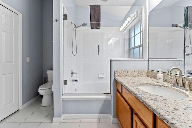 full bath with tile patterned flooring, vanity, toilet, baseboards, and shower / bathing tub combination