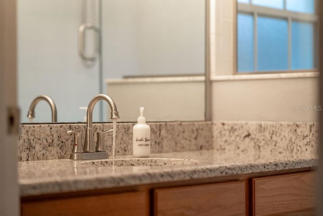 room details with vanity and decorative backsplash