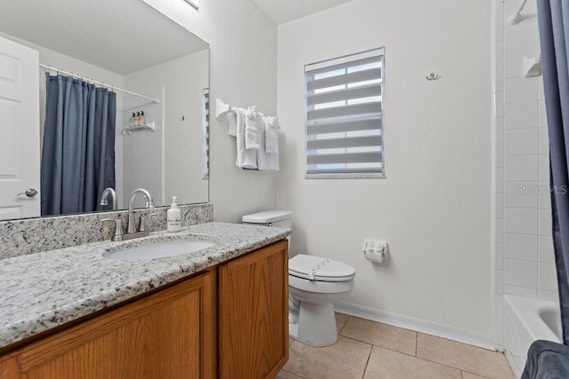 bathroom featuring tile patterned flooring, baseboards, vanity, toilet, and shower / bathtub combination with curtain