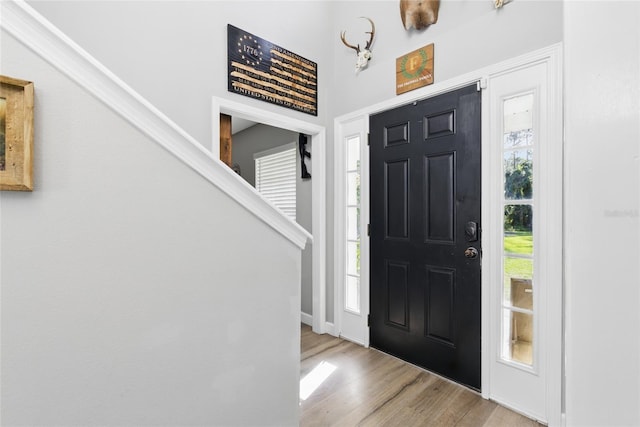 1555 Seminole Run Rd, Osteen, FL 32764 - foyer entrance with baseboards and wood finished floors