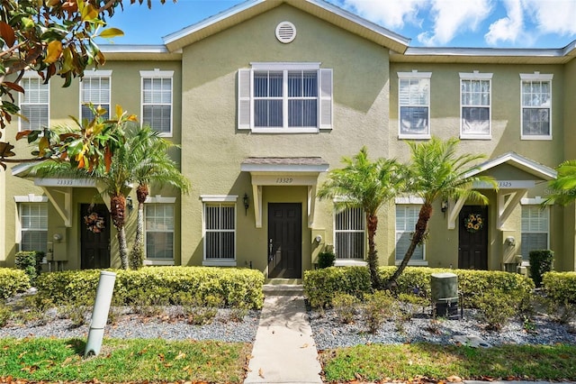 view of property with stucco siding