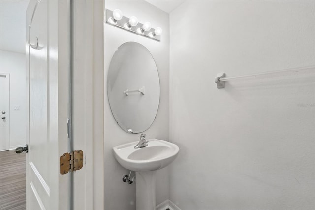 bathroom featuring baseboards