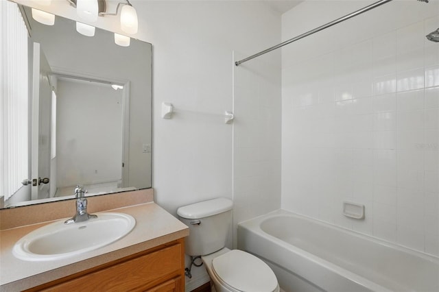 full bath with toilet,  shower combination, and vanity