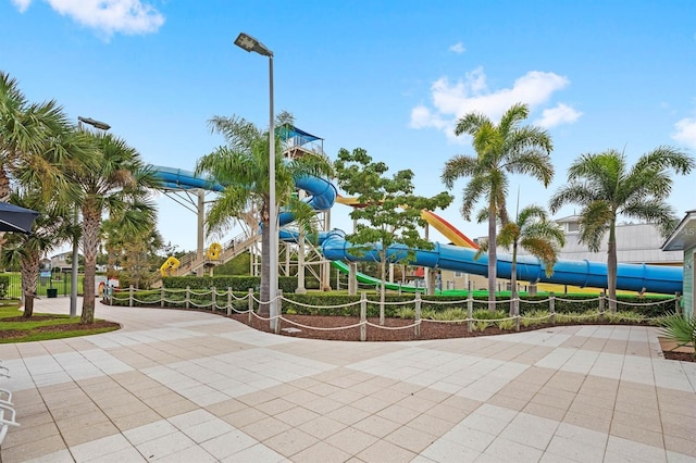 view of home's community featuring playground community